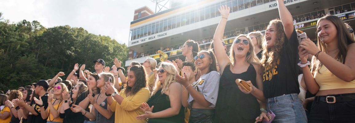 students at an App State football game